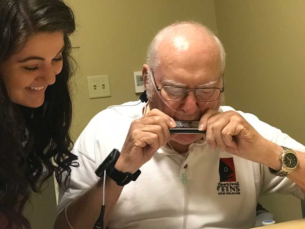 Pulmonary-rehabilitation-patient-playing-the-harmonica-as-part-of-Baton-Rouge-General-Hospital_s-Art-in-Medicine-program.-Playing-the-harmonica-helps-to-improve-lung-function.jpg