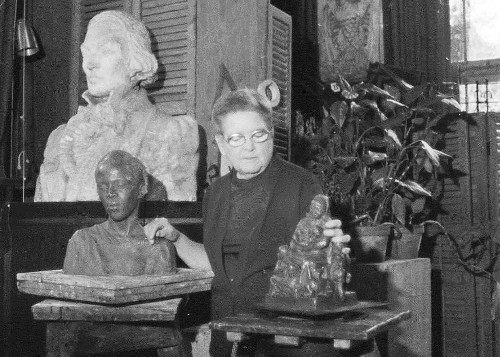 Angela-Gregory-in-her-studio-in-1979-with-the-plasters-versions-of-some-her-best-known-works.jpg