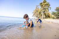 Children playing at one of the Northshore's Beaches