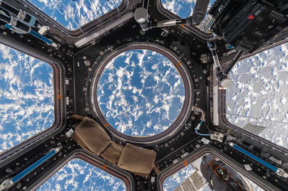 Roland-Miller-and-Paolo-Nespoli,-Cupola-with-Clouds-and-Ocean,-2020.-Chromogenic-color-print.-Courtesy-of-the-artist..png
